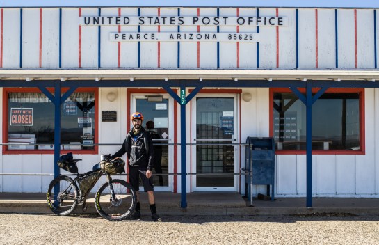 Thanks to Postmaster Bill for the photo, he's got one heck of a view. I rode back into town to fix a flat. Luckily the small town hardware store had flat kits, since mine was resting nicely back in the truck...